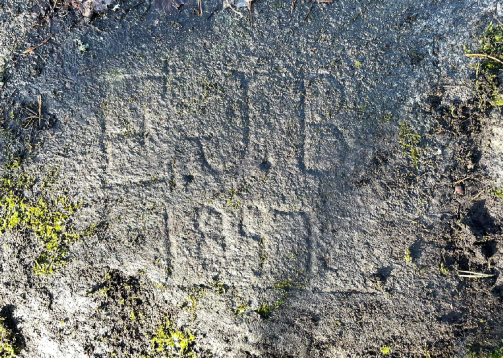 E.J.B 1857 ristat i sten