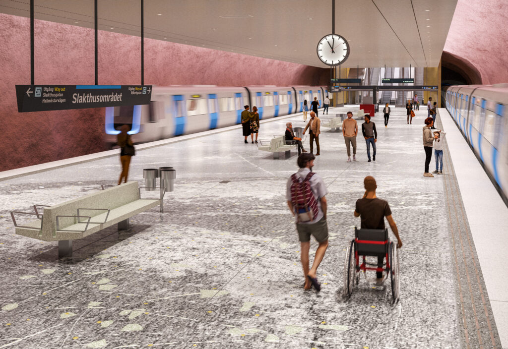 En grupp människor som går runt på perrongen i Slakthusområdet. Två tunnelbanetåg kommer in på stationen.