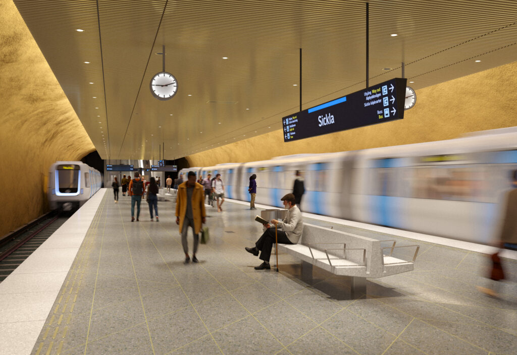 En grupp människor som går runt på framtidens plattform på station Sickla.