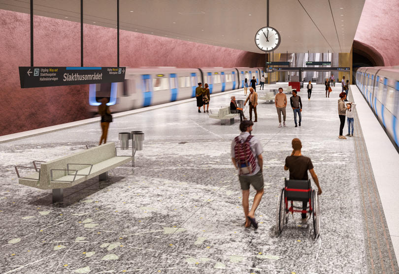Människor på perrongen på blivande tunnelbanestation Slakthusområdet.