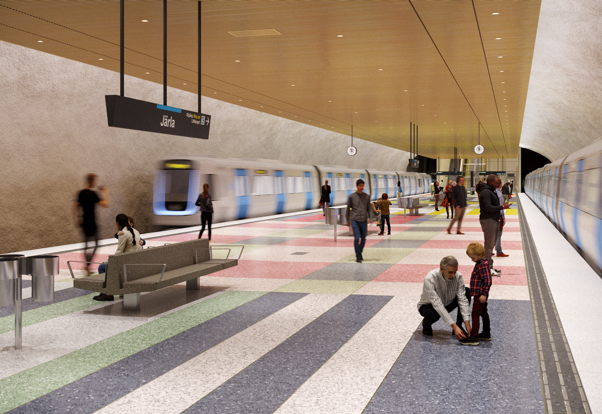 Plattformsrum med tunnelbanetåg på båda sidor.