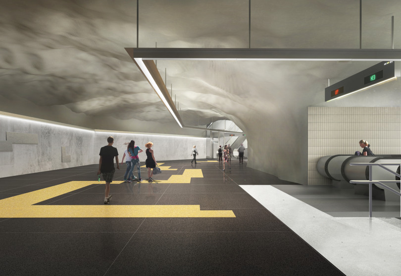 En grupp människor som går på en tunnelbanestation.